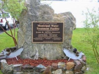 Stone with plaque that reads Water Treatment Plant