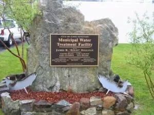 Stone with plaque that reads Water Treatment Plant